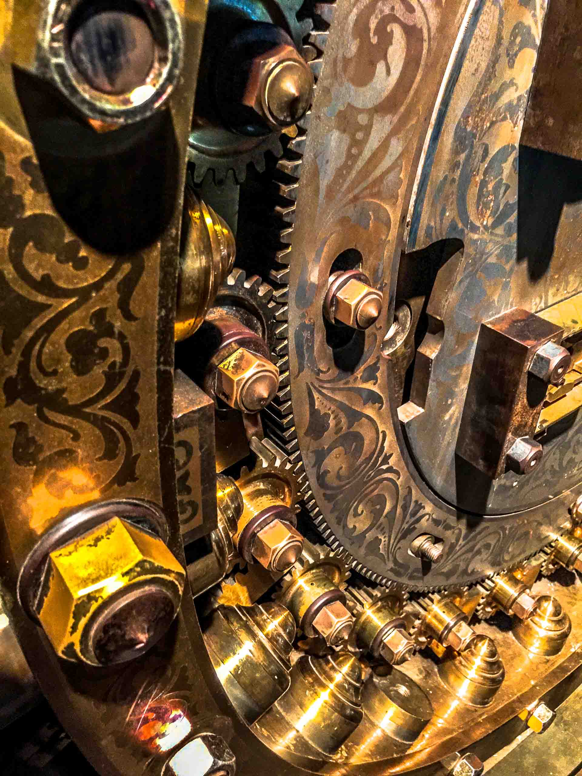 Bank vault lock mechanism — ornate gilded gears and engravings